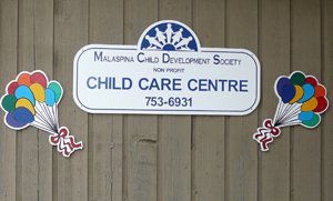 The Child Care Centre sign with balloon decorations